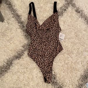 Cheetah cowl neck bodysuit.